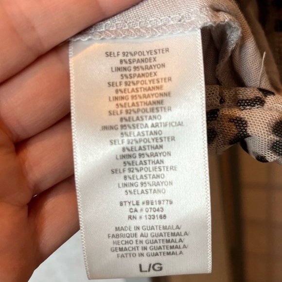 Anthropologie Eri + Ali animal print faux wrap top with bell long sleeves - Picture 4 of 5